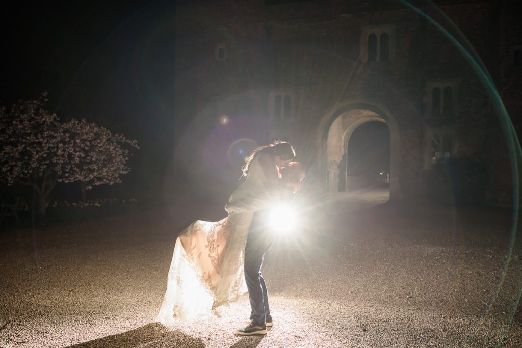 wedding photography at hodsock priory at night time. A night time photograph of the bride and groom.